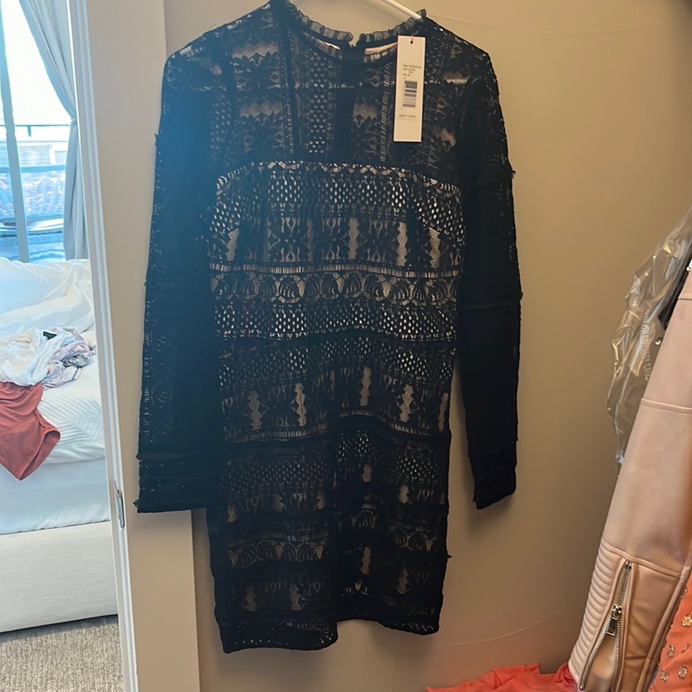 Black lace Parker dress. Never worn.